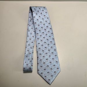 Into Africa Silk tie. Light blue w/ gray ostriches.